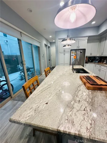 a bed room with a bed and mirror