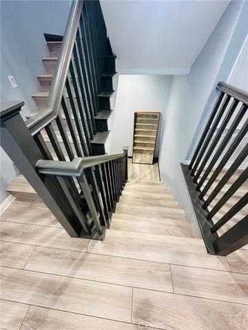 a living room with furniture or couch and a bookshelf