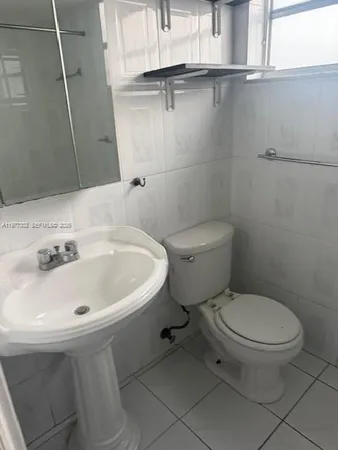 a kitchen with a stove and a microwave