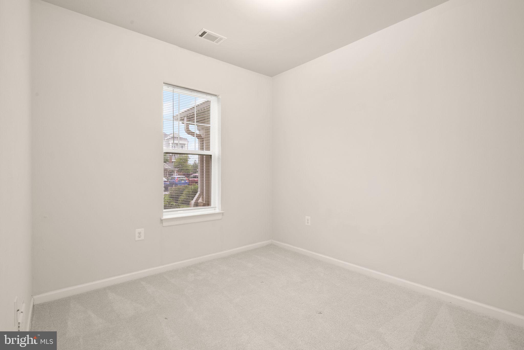 20610 Hope Spring Terrace, Unit 104 Ashburn, VA 20147 - Photo 18 of 38 Bedroom