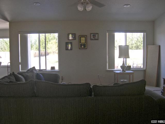 4190 Alcorn Road Fallon, NV 89406 - Photo 2 of 4 a living room with furniture and a window