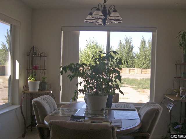 4190 Alcorn Road Fallon, NV 89406 - Photo 3 of 4 a view of a dining room with furniture window and outside view