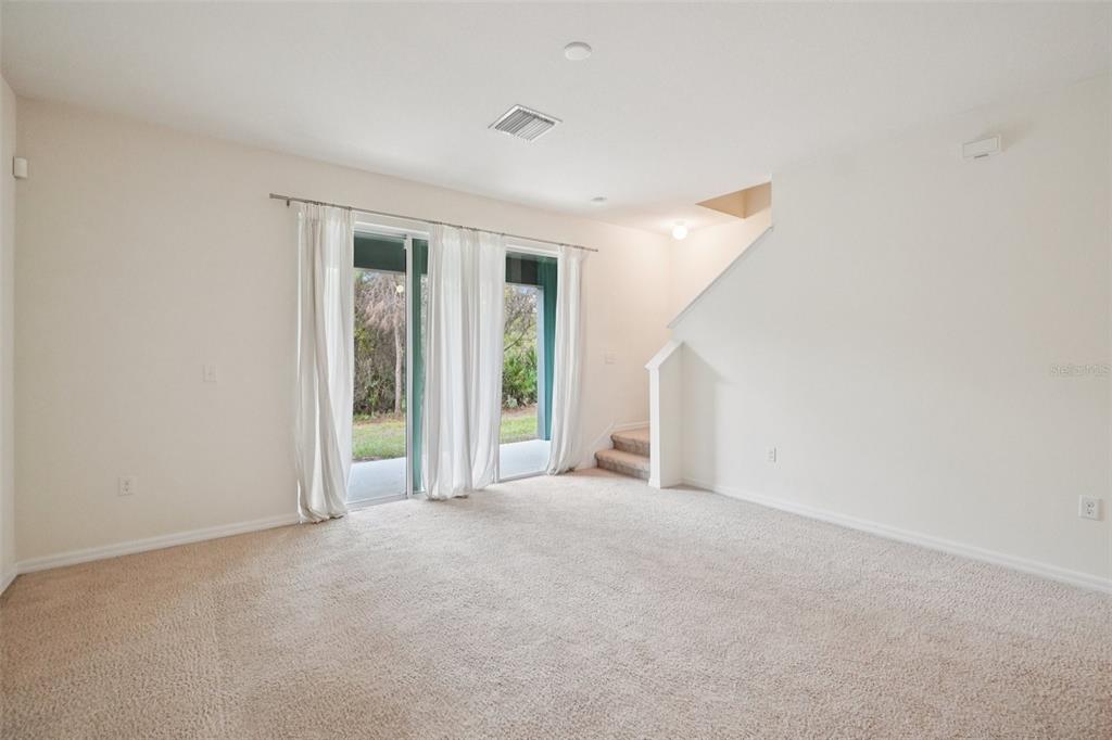 8986 Indigo Trail Loop Riverview, FL 33578 - Photo 15 of 48 a view of an empty room with closet and a window