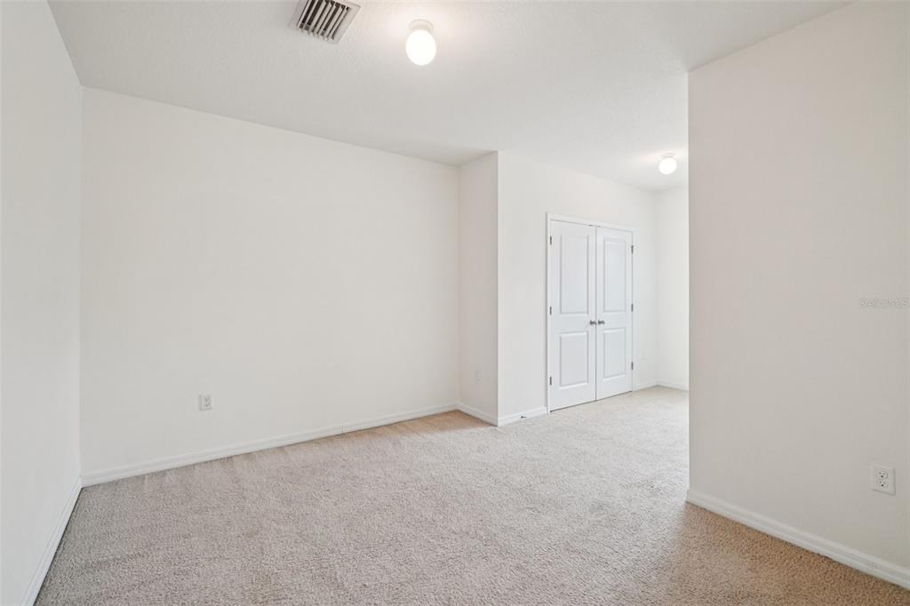 8986 Indigo Trail Loop Riverview, FL 33578 - Photo 27 of 48 a view of an empty room