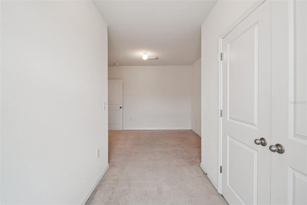 8986 Indigo Trail Loop Riverview, FL 33578 - Photo 29 of 48 a view of a hallway