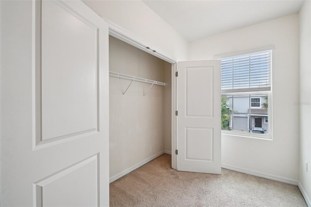 8986 Indigo Trail Loop Riverview, FL 33578 - Photo 30 of 48 an empty room with windows