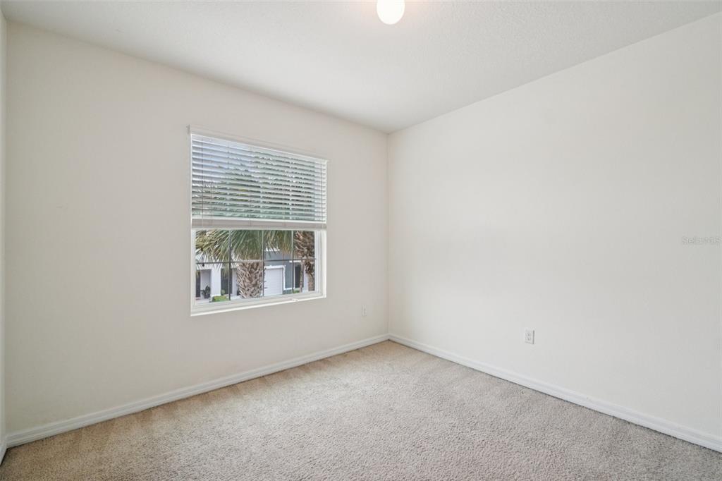 8986 Indigo Trail Loop Riverview, FL 33578 - Photo 33 of 48 an empty room with a window