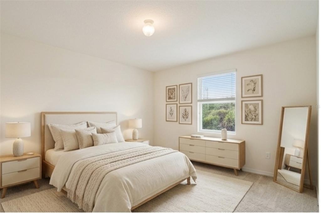 8986 Indigo Trail Loop Riverview, FL 33578 - Photo 34 of 48 a bedroom with a bed and a window