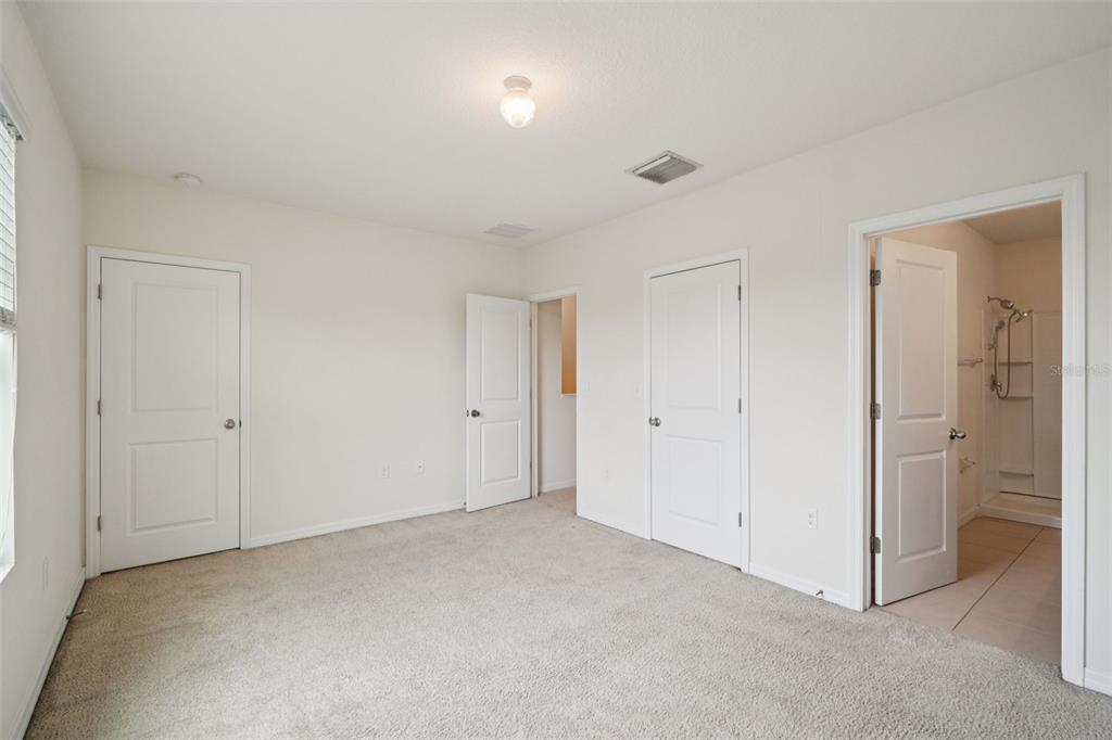 8986 Indigo Trail Loop Riverview, FL 33578 - Photo 38 of 48 a view of an empty room