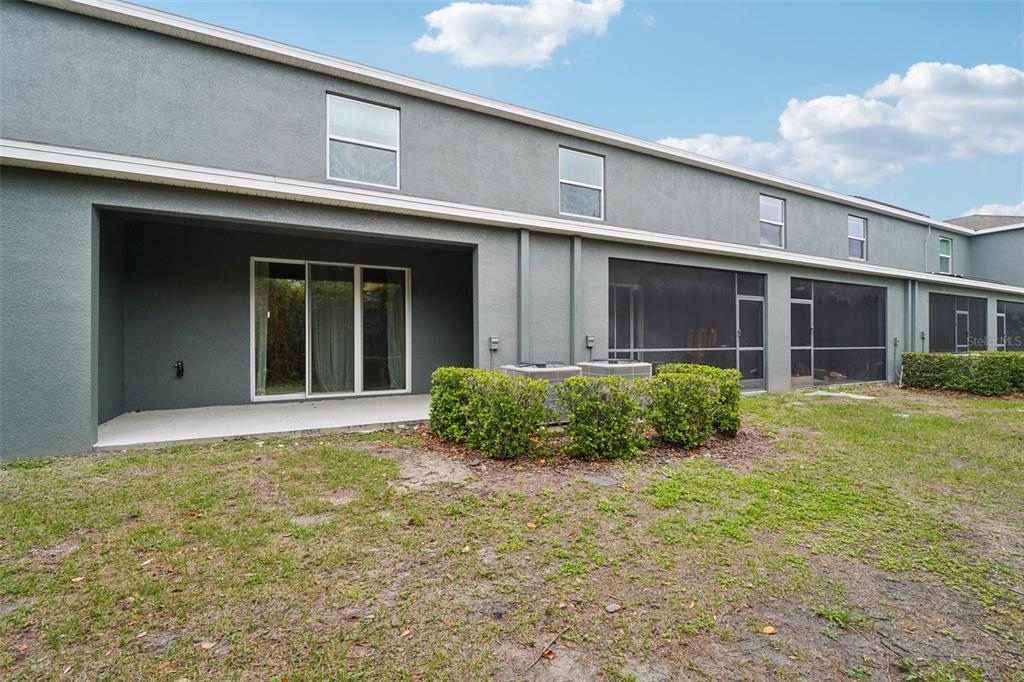 8986 Indigo Trail Loop Riverview, FL 33578 - Photo 42 of 48 a view of house with yard