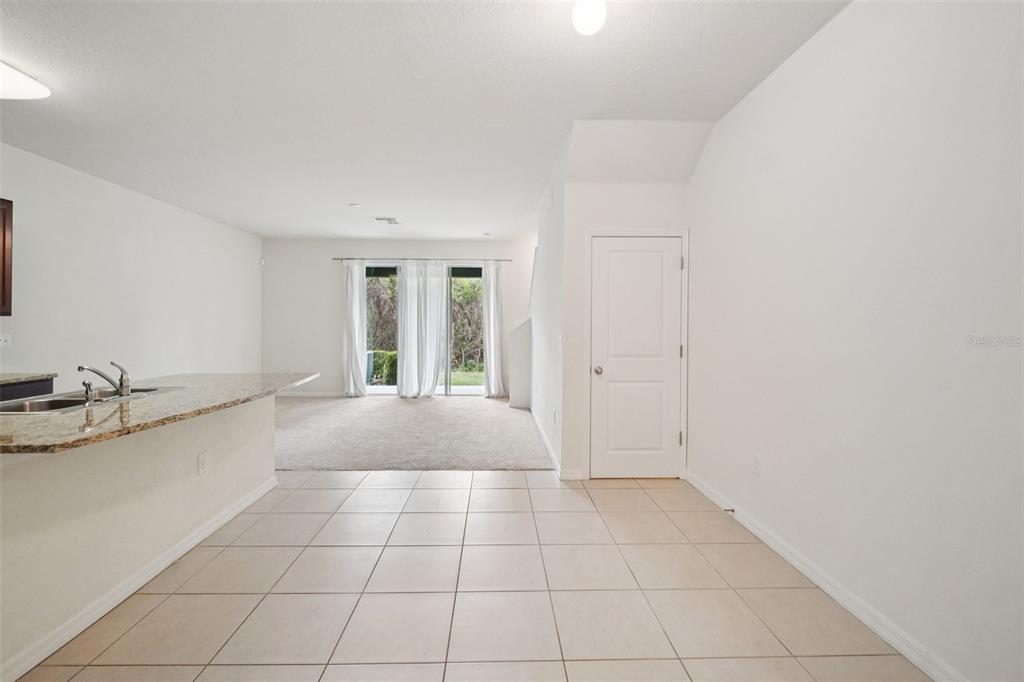 8986 Indigo Trail Loop Riverview, FL 33578 - Photo 5 of 48 a view of an empty room with a window