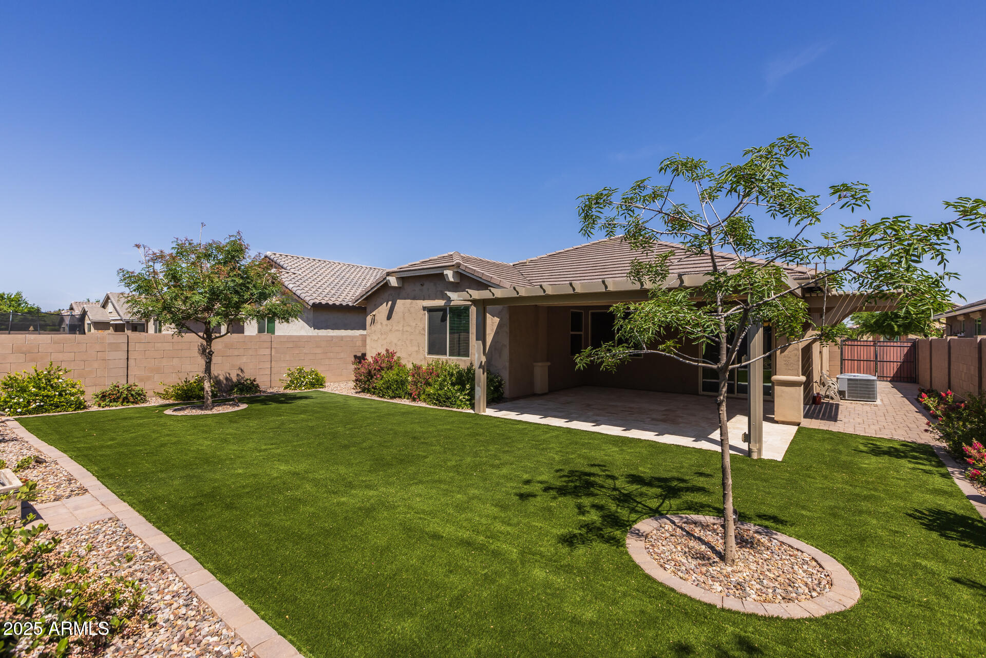 20673 East Canary Way Queen Creek, AZ 85142 - Photo 20 of 36 20) BACK OF HOME