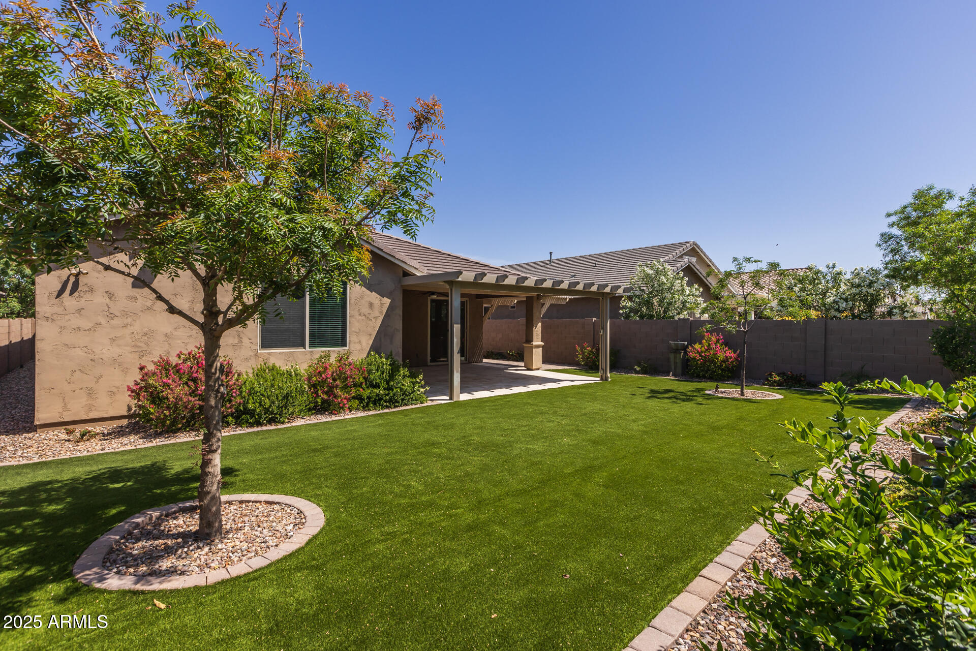 20673 East Canary Way Queen Creek, AZ 85142 - Photo 21 of 36 21) BACK OF HOME