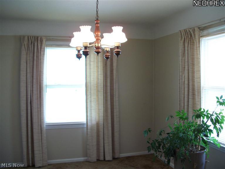 6562 Crossview Road Independence, OH 44131 - Photo 3 of 9 Formal Dining Room hardwood floors under carpet.