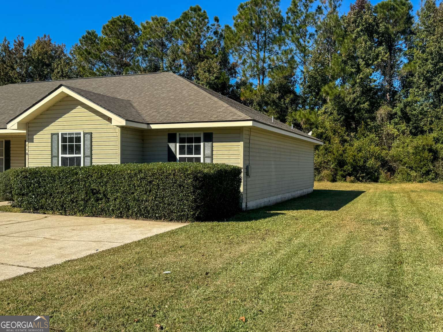 110 Talbot Court St. Marys, GA 31558 - Photo 16 of 16 a house view with a garden space