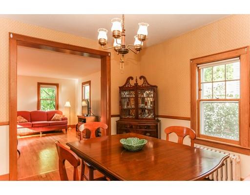 104 Maple Road Longmeadow, MA 01106 - Photo 11 of 28 a view of a dining room with furniture a chandelier and wooden floor