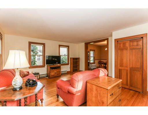 104 Maple Road Longmeadow, MA 01106 - Photo 14 of 28 a living room with furniture a flat screen tv and a window