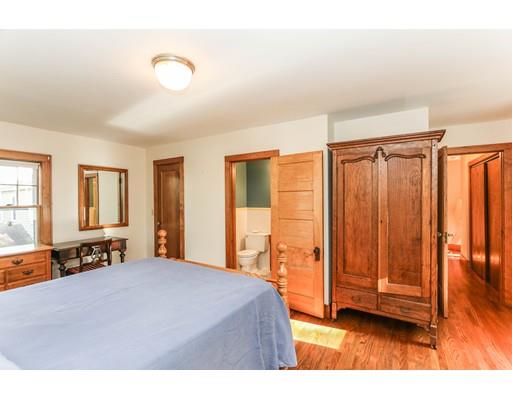 104 Maple Road Longmeadow, MA 01106 - Photo 17 of 28 a spacious bedroom with a bed and wooden floor