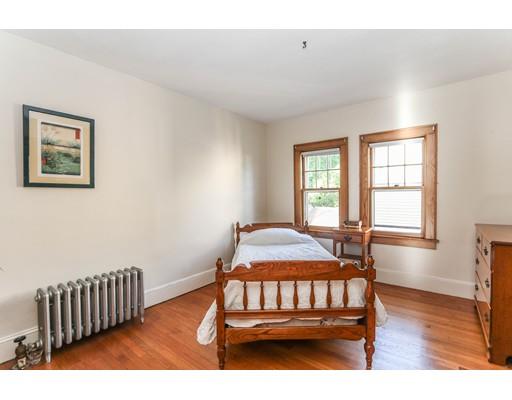 104 Maple Road Longmeadow, MA 01106 - Photo 19 of 28 a bedroom with a bed and wooden floor