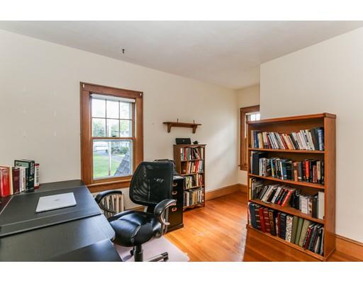 104 Maple Road Longmeadow, MA 01106 - Photo 24 of 28 a living room with furniture and a book shelf