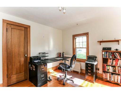 104 Maple Road Longmeadow, MA 01106 - Photo 25 of 28 a view of a workspace with furniture and a book shelf