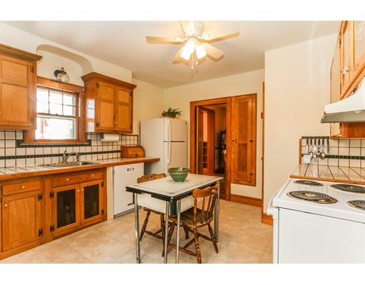 104 Maple Road Longmeadow, MA 01106 - Photo 7 of 28 a kitchen with a stove a sink dishwasher and a refrigerator