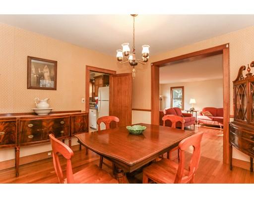 104 Maple Road Longmeadow, MA 01106 - Photo 10 of 28 a view of a dining room with furniture and a chandelier