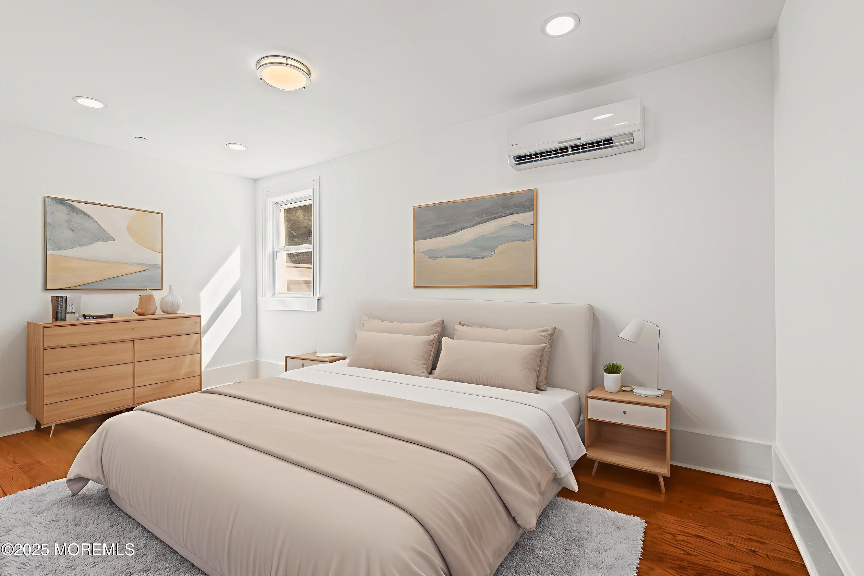 73 3rd Avenue Atlantic Highlands, NJ 07716 - Photo 14 of 57 a bedroom with a bed and a dresser