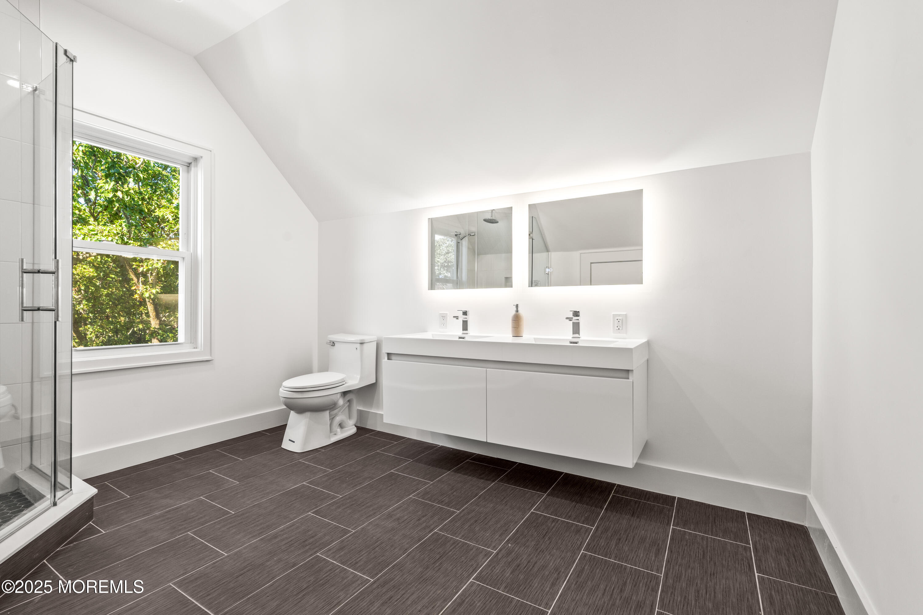 73 3rd Avenue Atlantic Highlands, NJ 07716 - Photo 18 of 57 a bathroom with a sink mirror and a window