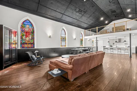 a view of swimming pool with outdoor seating