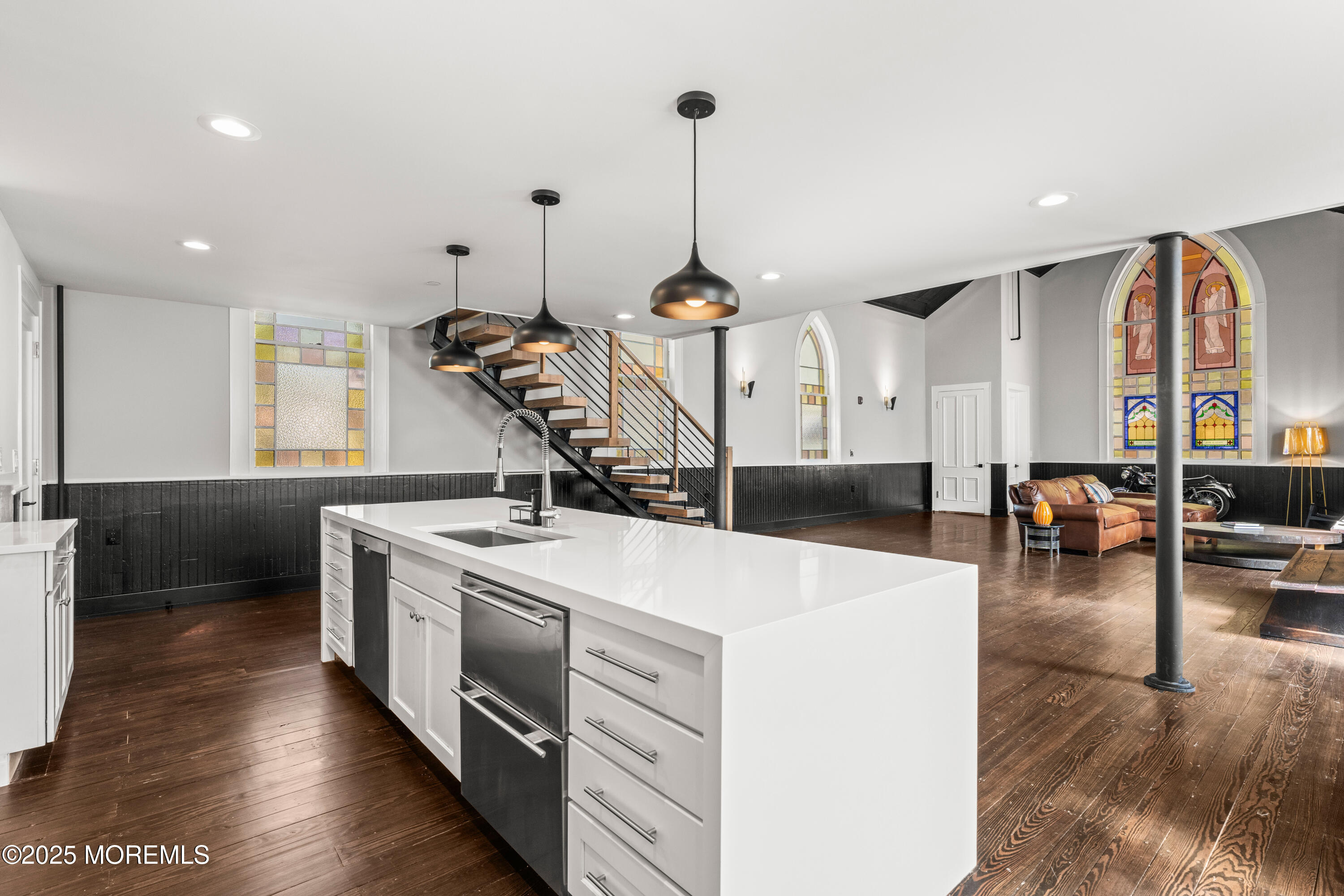 73 3rd Avenue Atlantic Highlands, NJ 07716 - Photo 41 of 57 a kitchen with stove and chairs