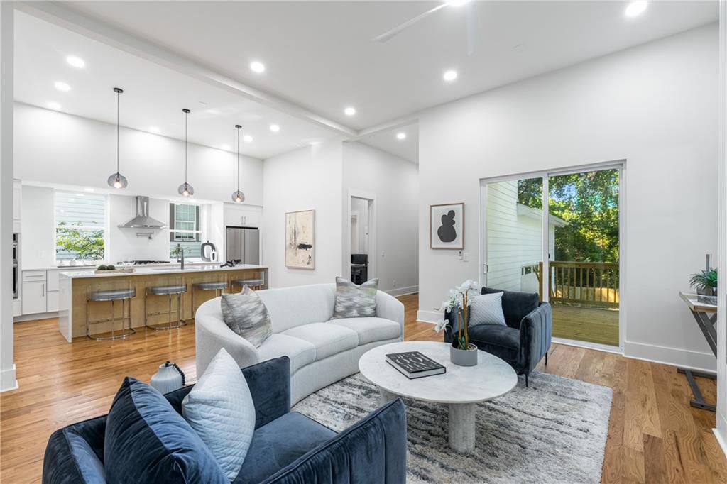 271 Haas Avenue Southeast Atlanta, GA 30316 - Photo 15 of 56 a living room with furniture and a wooden floor