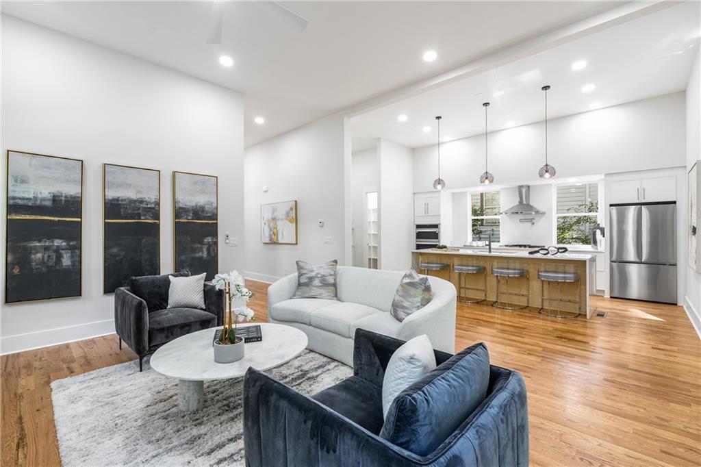271 Haas Avenue Southeast Atlanta, GA 30316 - Photo 16 of 56 a living room with furniture kitchen and a large window