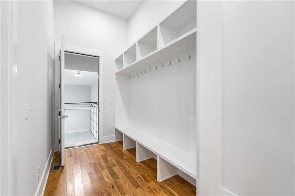 271 Haas Avenue Southeast Atlanta, GA 30316 - Photo 21 of 56 a view of walk in closet with wooden floor
