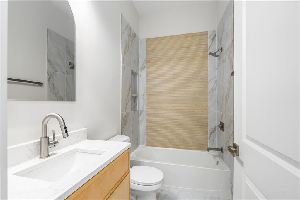 271 Haas Avenue Southeast Atlanta, GA 30316 - Photo 24 of 56 a bathroom with a sink toilet and shower