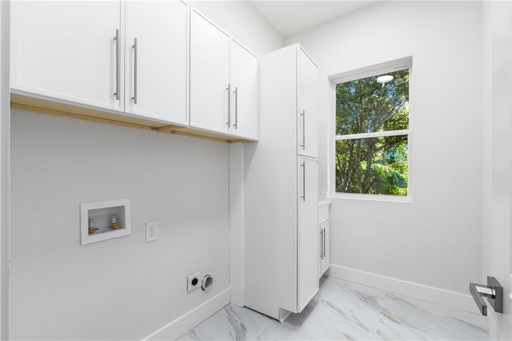271 Haas Avenue Southeast Atlanta, GA 30316 - Photo 26 of 56 a bathroom with a window