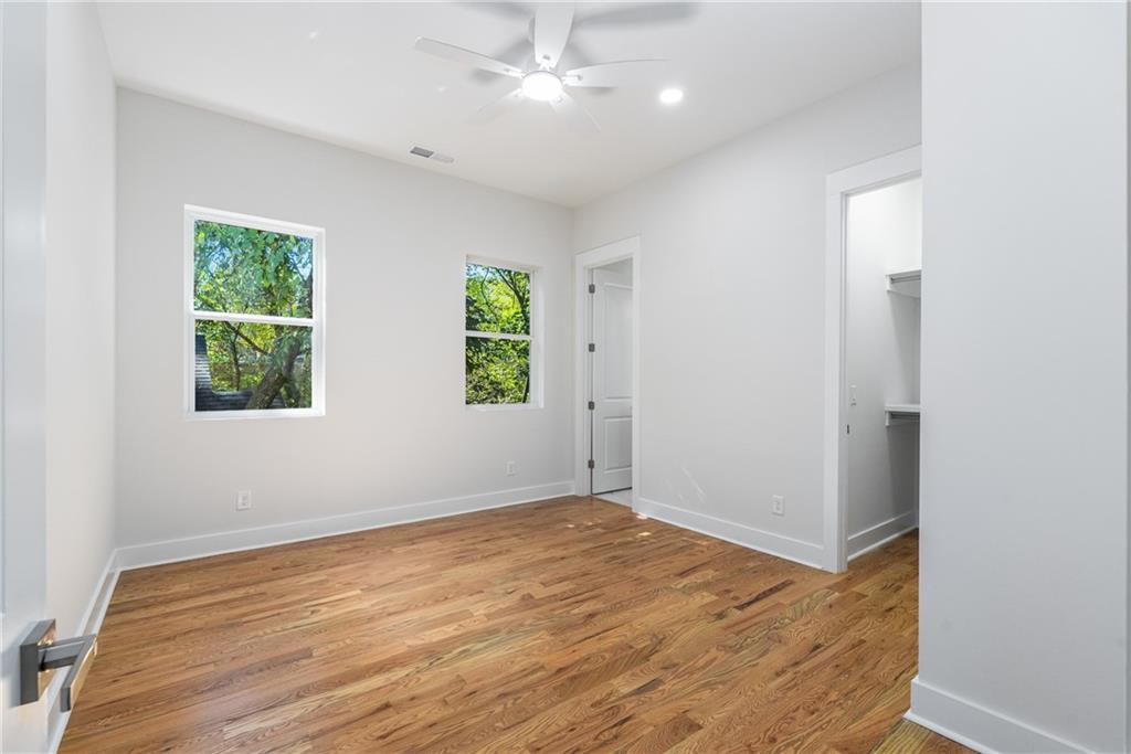 271 Haas Avenue Southeast Atlanta, GA 30316 - Photo 27 of 56 an empty room with windows and closet
