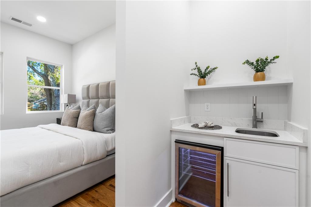 271 Haas Avenue Southeast Atlanta, GA 30316 - Photo 33 of 56 a bedroom with a bed and a sink