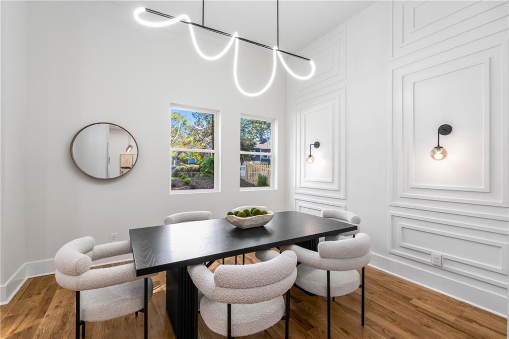 271 Haas Avenue Southeast Atlanta, GA 30316 - Photo 4 of 56 a view of a dining room with furniture window and wooden floor