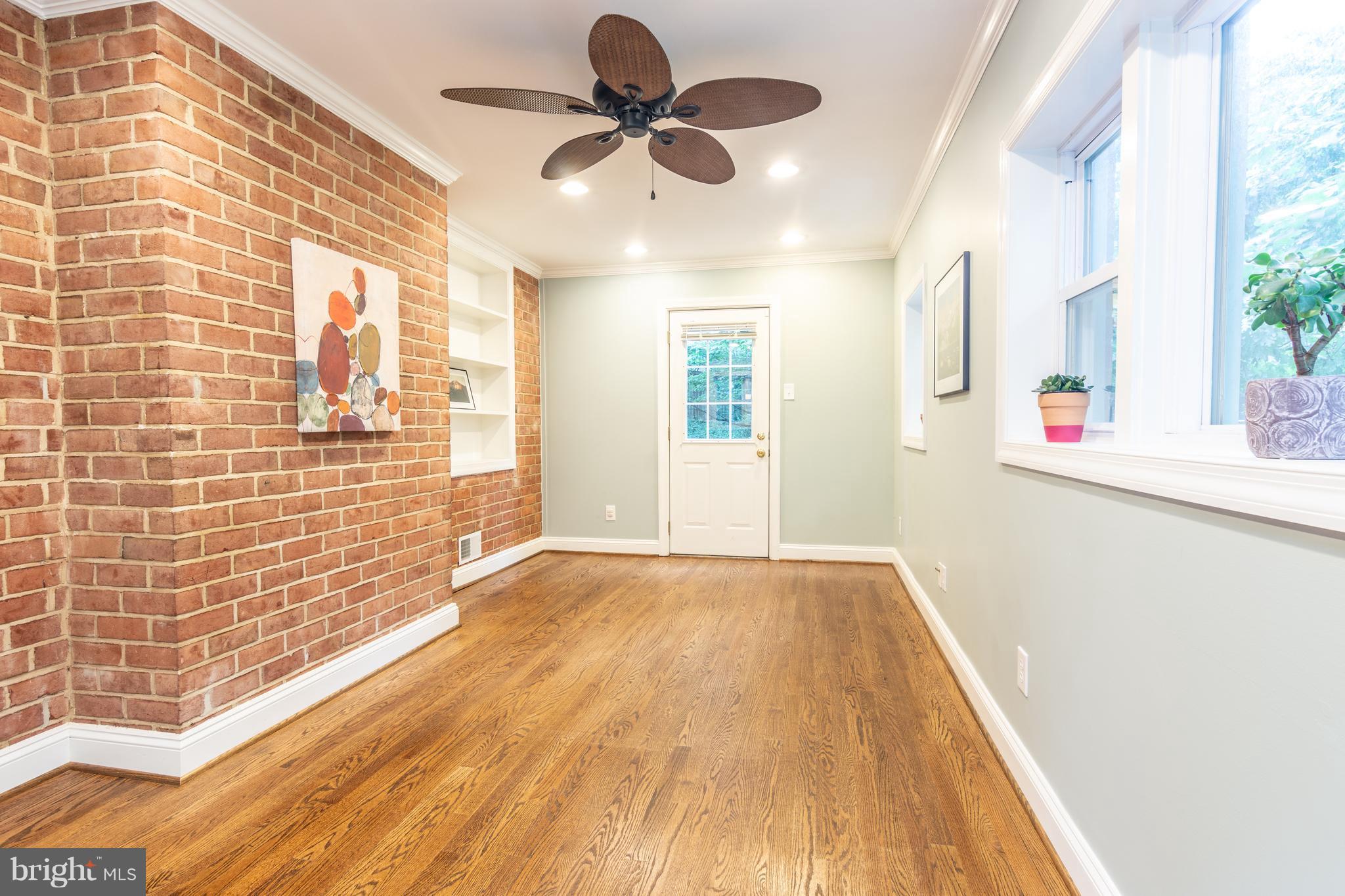 400 East Schuyler Road Silver Spring, MD 20901 - Photo 12 of 30 Insulated sunroom makes perfect office, guest room