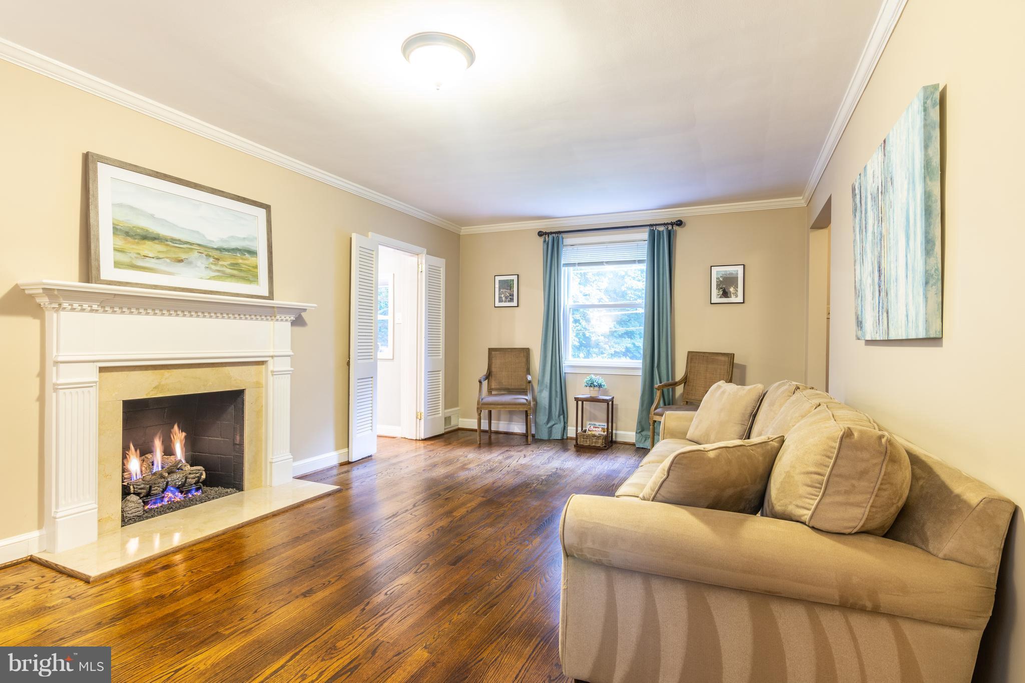 400 East Schuyler Road Silver Spring, MD 20901 - Photo 8 of 30 Living Room: spacious but cozy. Gas fireplace!