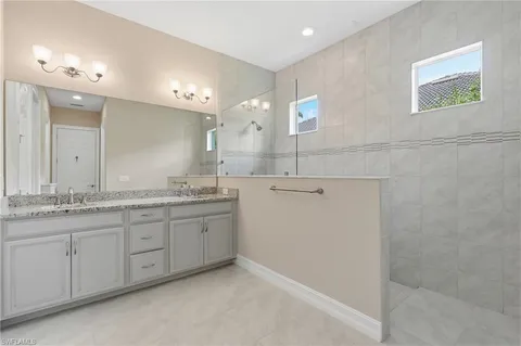 $885,000 | 10240 Avonleigh Drive, Bonita Springs, FL 34135
