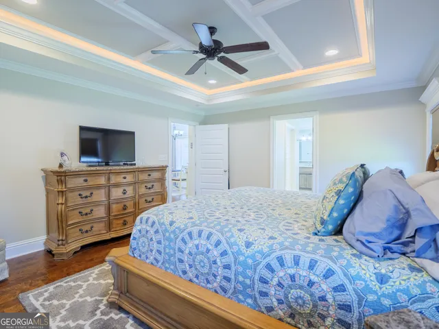 a white toilet sitting next to a shower