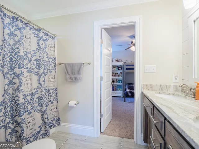 a view of an house with backyard porch and sitting area