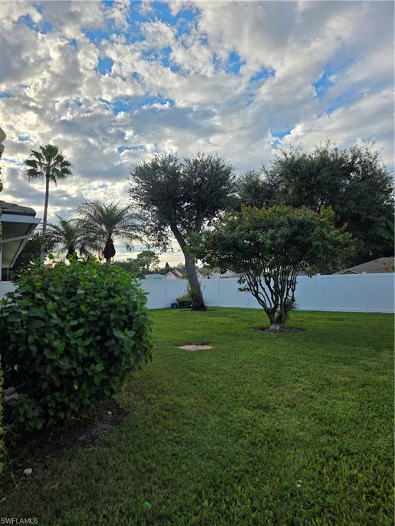 857 Summerfield Drive Naples, FL 34120 - Photo 19 of 50 a view of outdoor space and yard