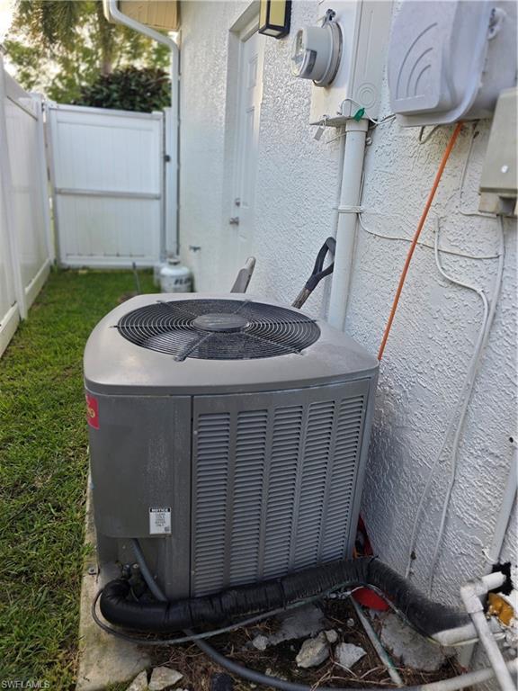 857 Summerfield Drive Naples, FL 34120 - Photo 24 of 50 a bathroom with a sink and a mirror