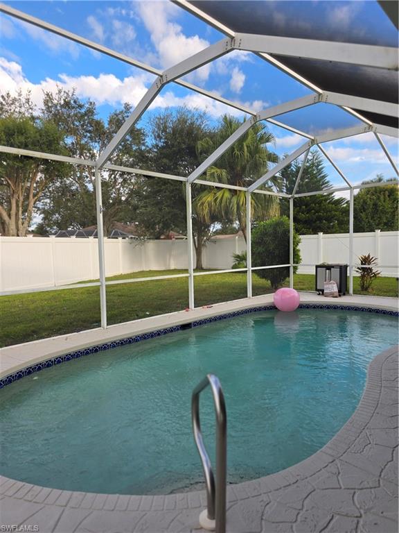 857 Summerfield Drive Naples, FL 34120 - Photo 26 of 50 a view of a backyard