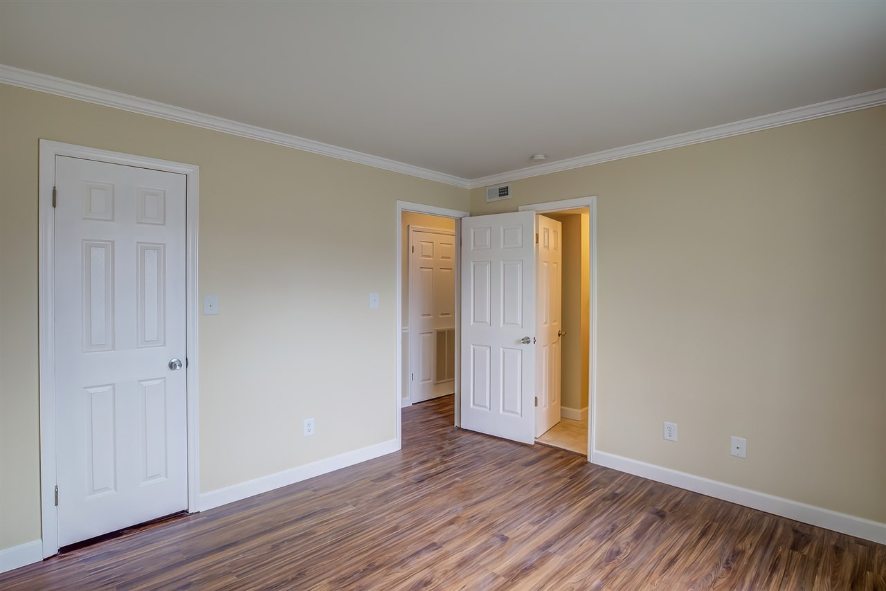 5608 Falls Of Neuse Road, Unit E Raleigh, NC 27609 - Photo 17 of 28 Second Bedroom w/ Direct Access to Guest Bath Bedroom