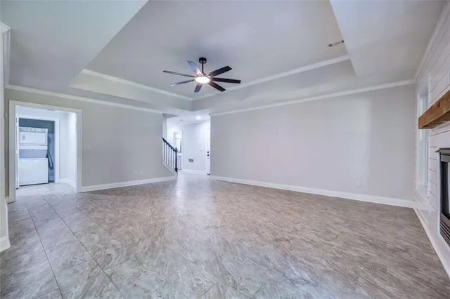 a kitchen with stainless steel appliances granite countertop a refrigerator stove a sink and a granite counter tops