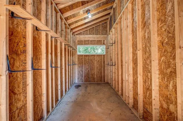 a view of a door with wooden floor